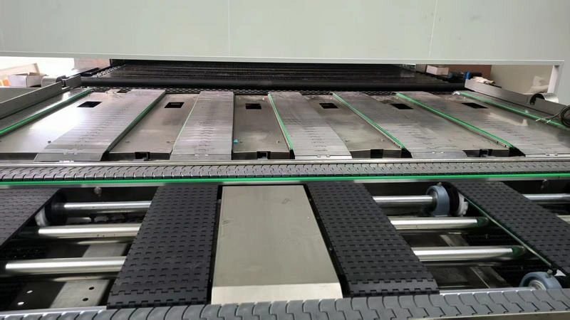 Automatic oven infeed unit